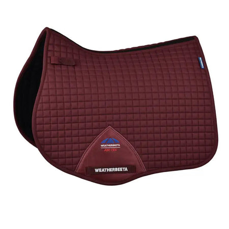 Maroon quilted saddle pad with Weatherbeeta logo on a white background