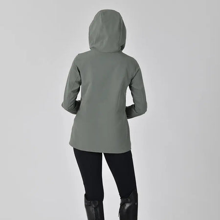 Person wearing a gray raincoat, black leggings, and black rain boots on a white background